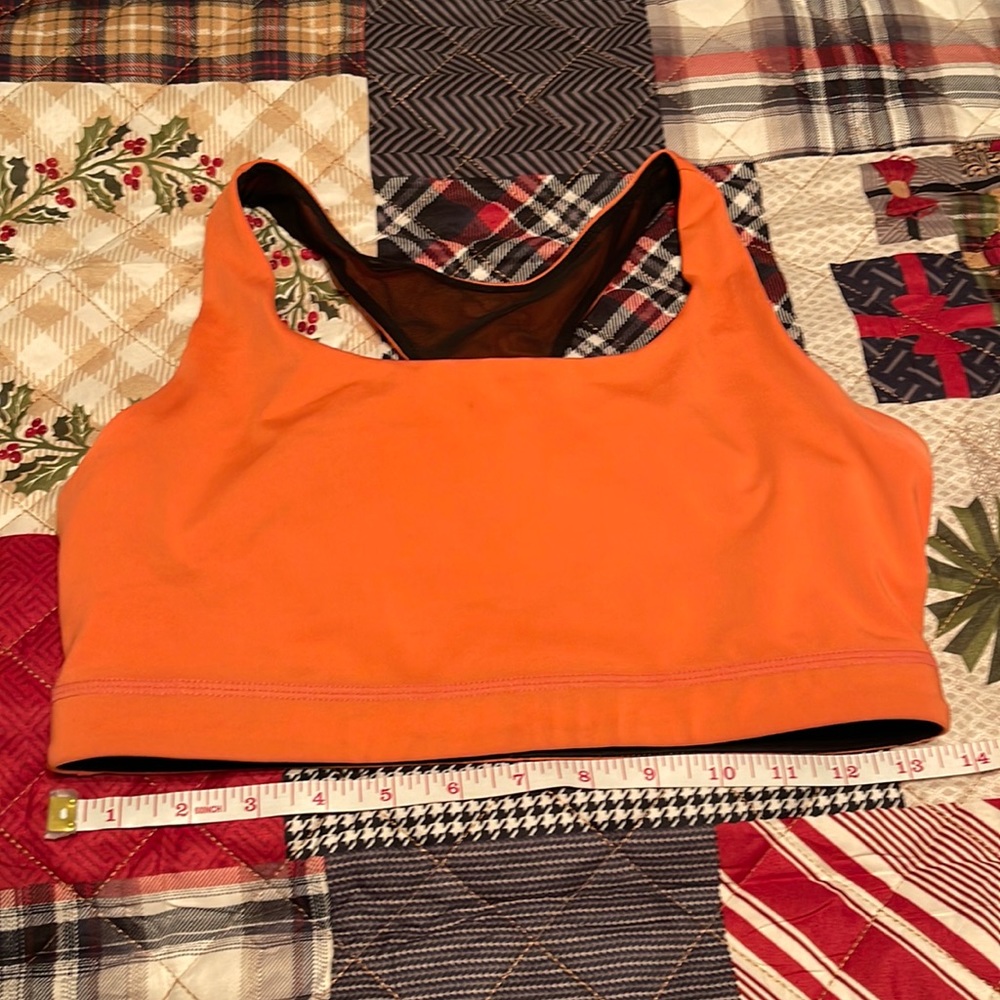 Icyzone sports bra in size medium and soft salmon color.
